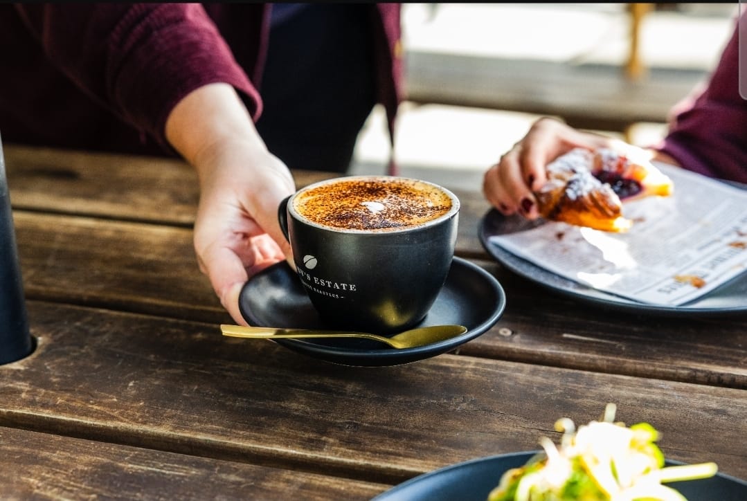 Cappuccino and pastry served at The Eve